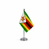 Drapeau bureau du Zimbabwe modèle Argent avec mât et socle en acier inoxydable